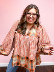 Under Your Spell Rust Plaid Color Block Notch Neck Top