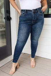Mid Rise Vintage Raw Hem Skinny Judy Blue Jeans