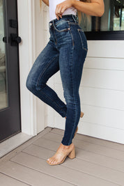 Mid Rise Vintage Raw Hem Skinny Judy Blue Jeans