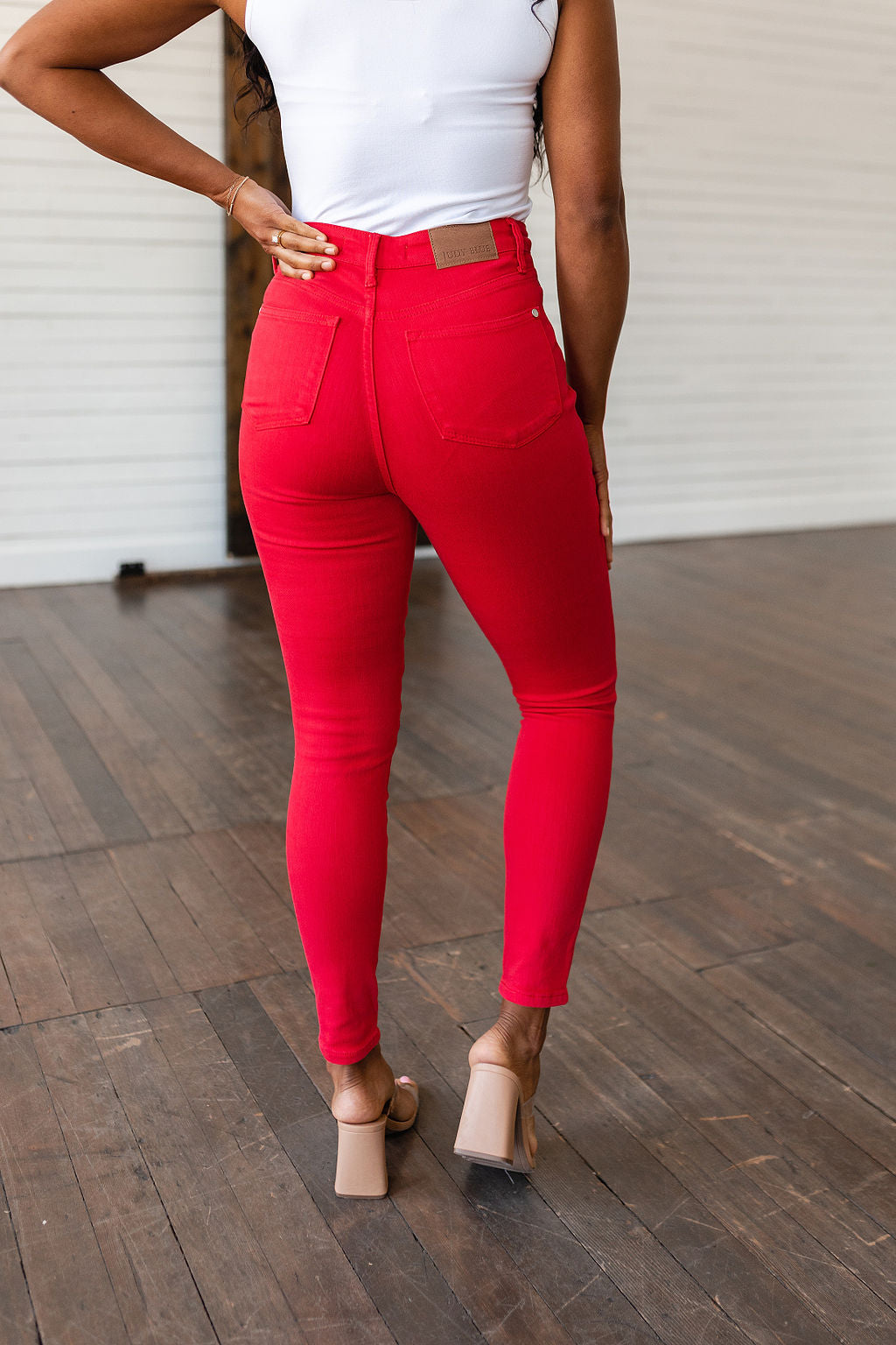 Ruby High Rise Tummy Control Garment Dyed Skinny Jeans in Red